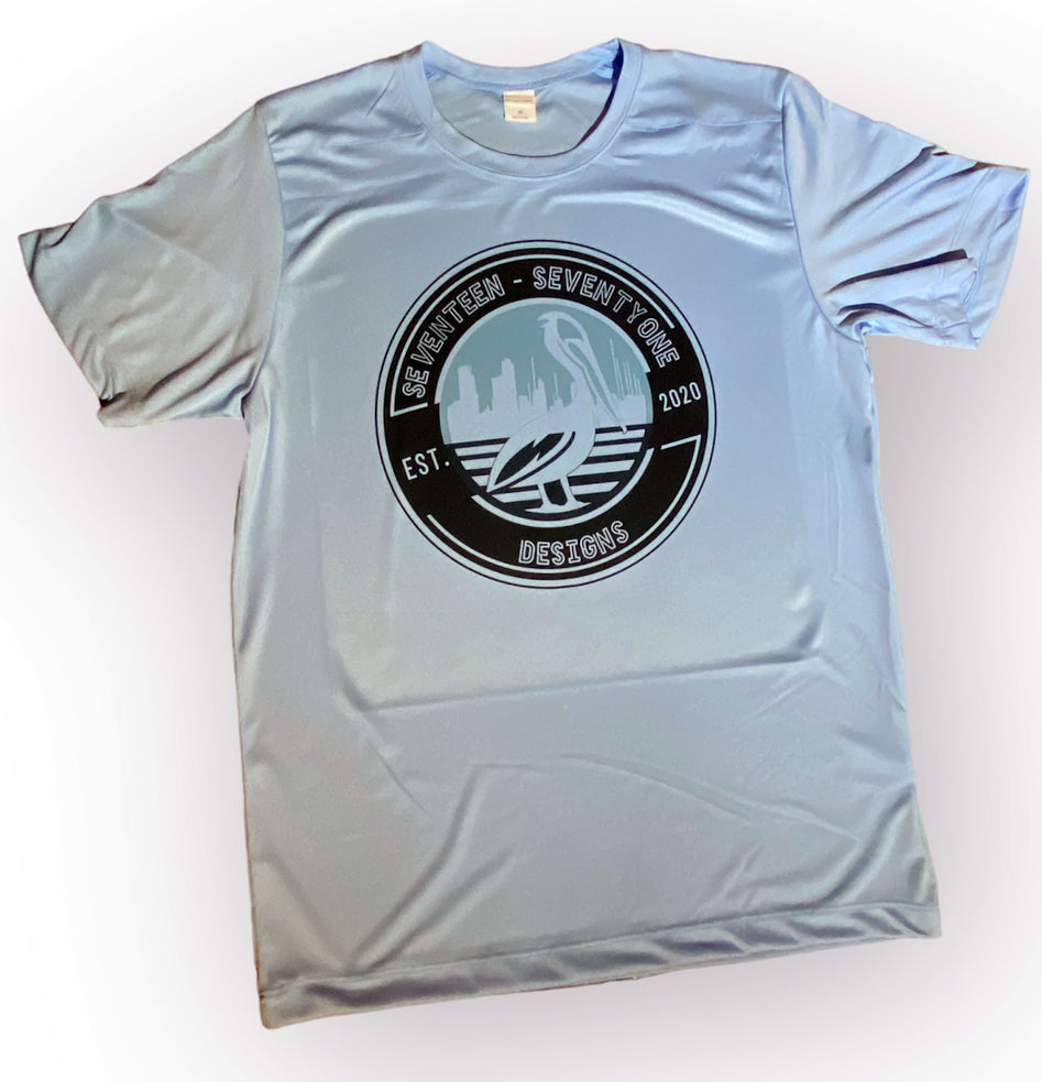 Light blue fishing shirt spf 50+ sun protection shirt featuring skyline of st. petersburg fl and pelican locally made t shirt