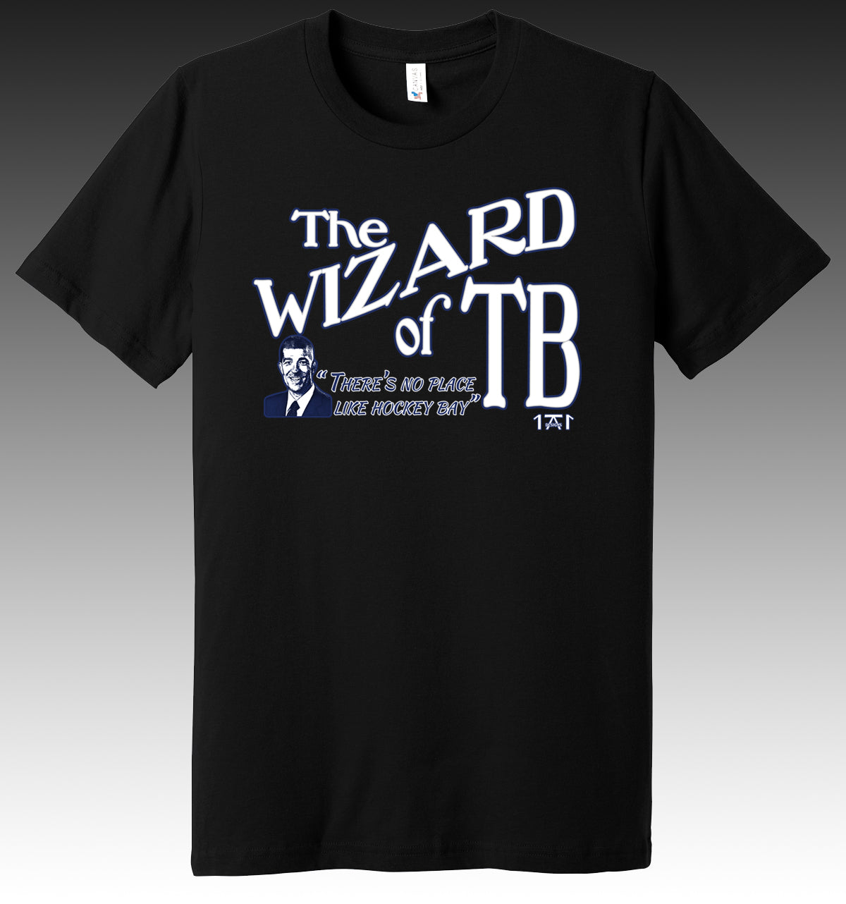 blue t shirt featuring the tampa bay lightning gm julian brisbois and the wizard of tampa bay keepin it local 